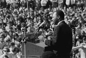 Dr. King giving a speech at an anti-Vietnam War rally at the University of Minnesota, April 27, 1967. After the Voting Rights Act of 1965 was passed, Dr. King began to publicly speak out against the war. (Photo via Wikipedia)