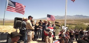 Cliven Bundy and supporters defying federal law enforcement, using loaded firearms. Double standard here? (YouTube)