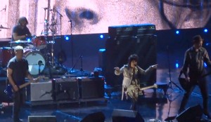 Joan Jett performing “Smells Like Teen Spirit” with the surviving members of Nirvana, at the Rock and Roll Hall of Fame induction ceremony. (Photo via YouTube Video)