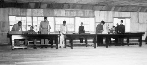 Delegates sign the Korean Armistice Agreement in Panmunjon, July 27, 1953. (Photo via Wikipedia)