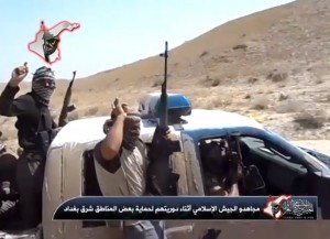 Screen shot from ISIS Twitter account showing insurgents in mid-size pick-up truck.